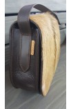 Leather shoulder bag and natural hair